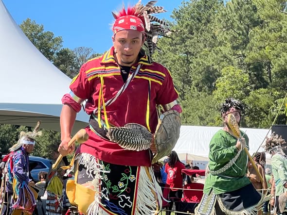 Nottoway dancer in red regalia at the annual powwow